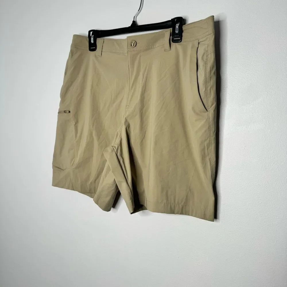 Under Armour tan shorts size 38